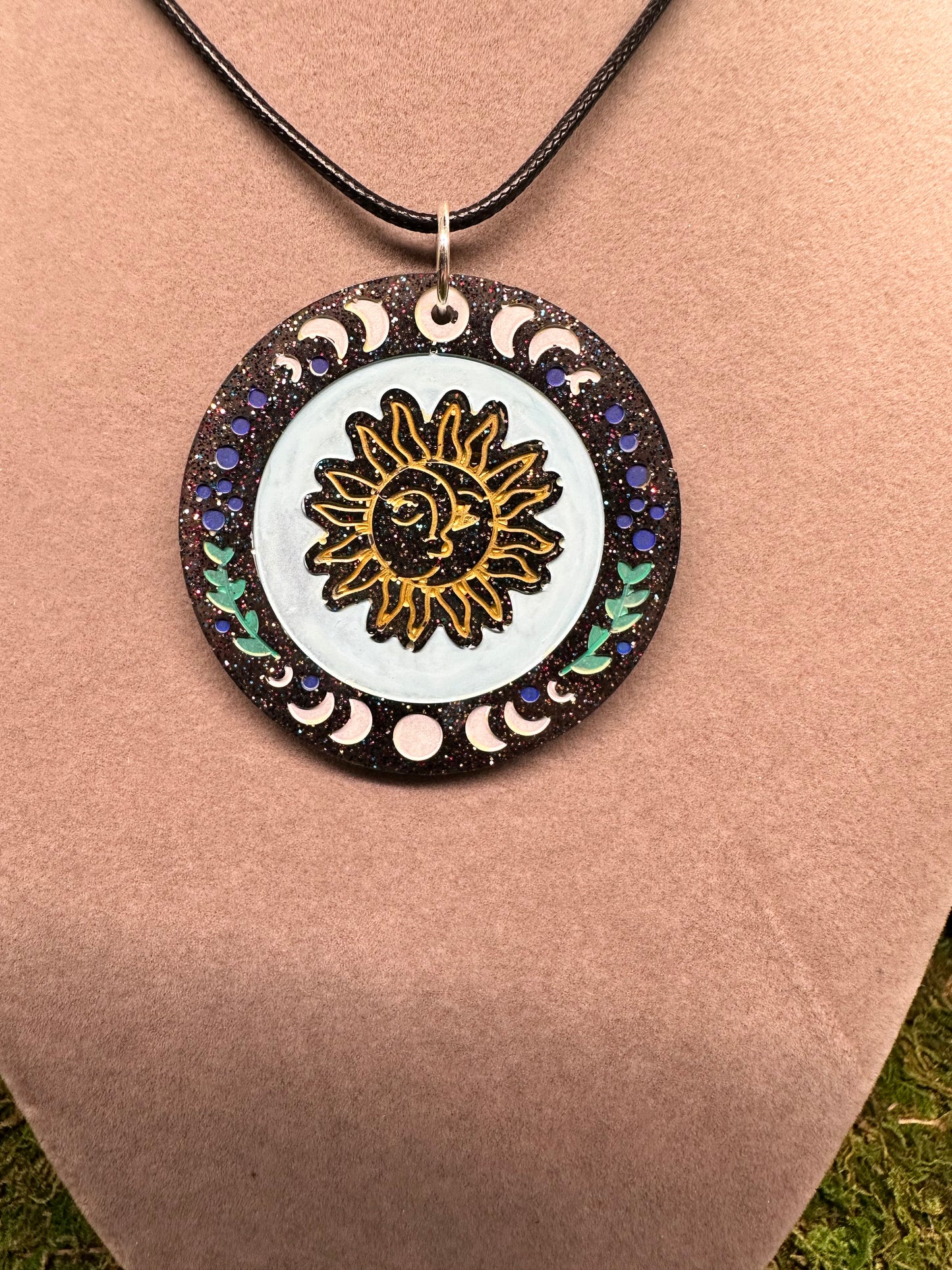 Circle Pendant with Sun and Moon Design