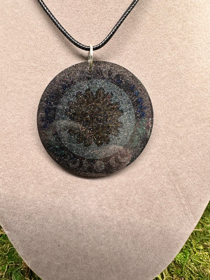 Circle Pendant with Sun and Moon Design