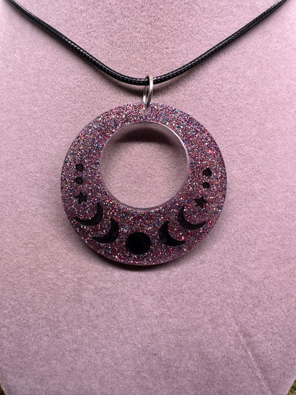 Cutout Circle Pendant with Black Moons