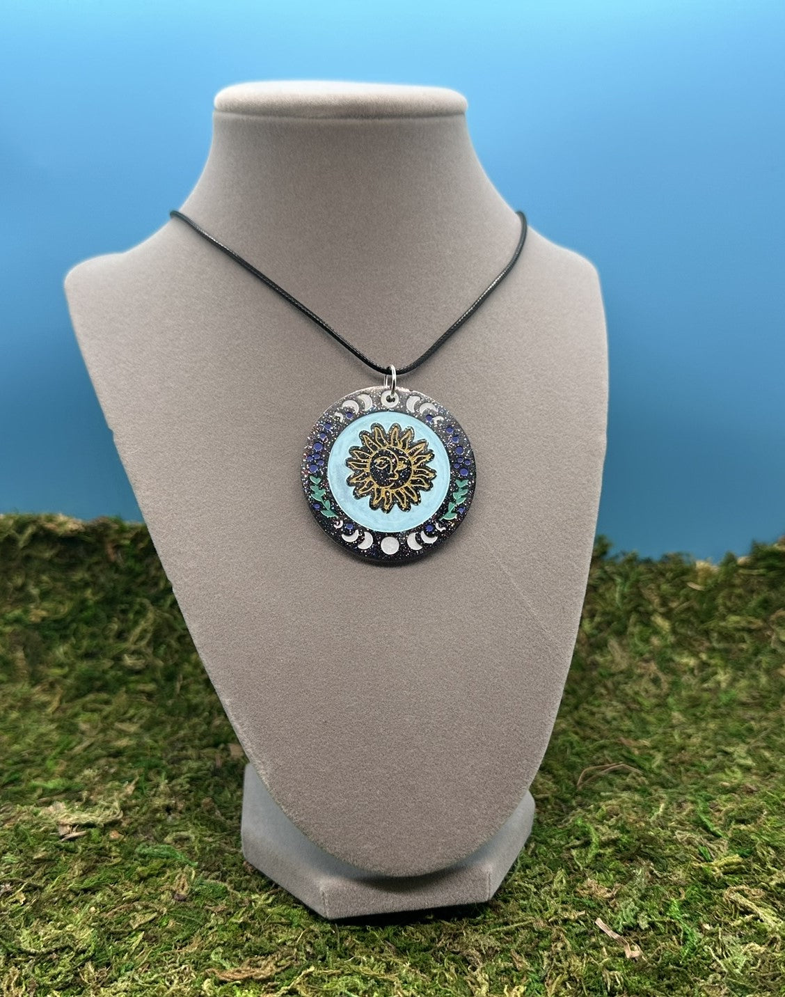 Circle Pendant with Sun and Moon Design