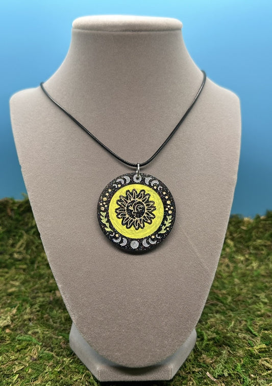 Circle Pendant with Sun and Moon designs