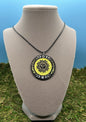 Circle Pendant with Sun and Moon designs