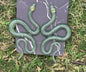 Scaled Translucent Green Snake Earrings